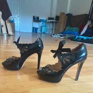 Lightly worn Joan & David black platform tie up heels